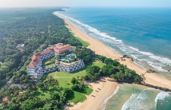 Premium beachfront resort for destination weddings with scenic shoreline views