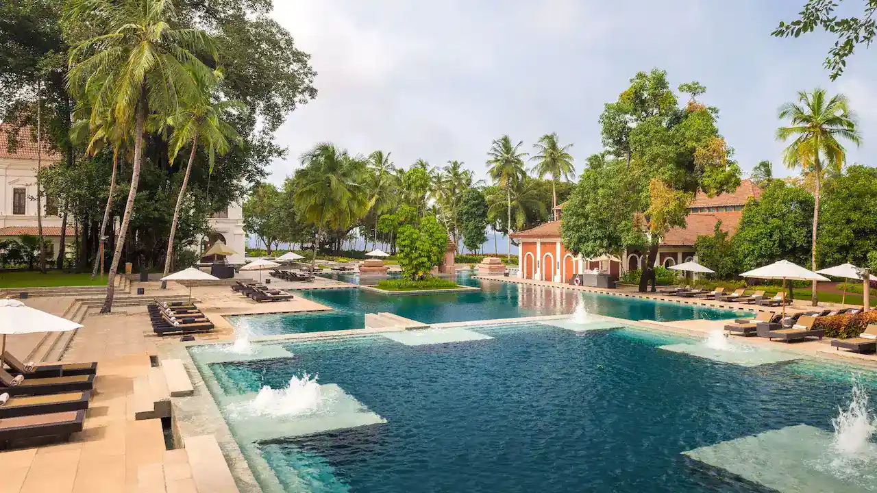 Grand Hyatt Goa exterior with lawns leading to Bambolim Bay