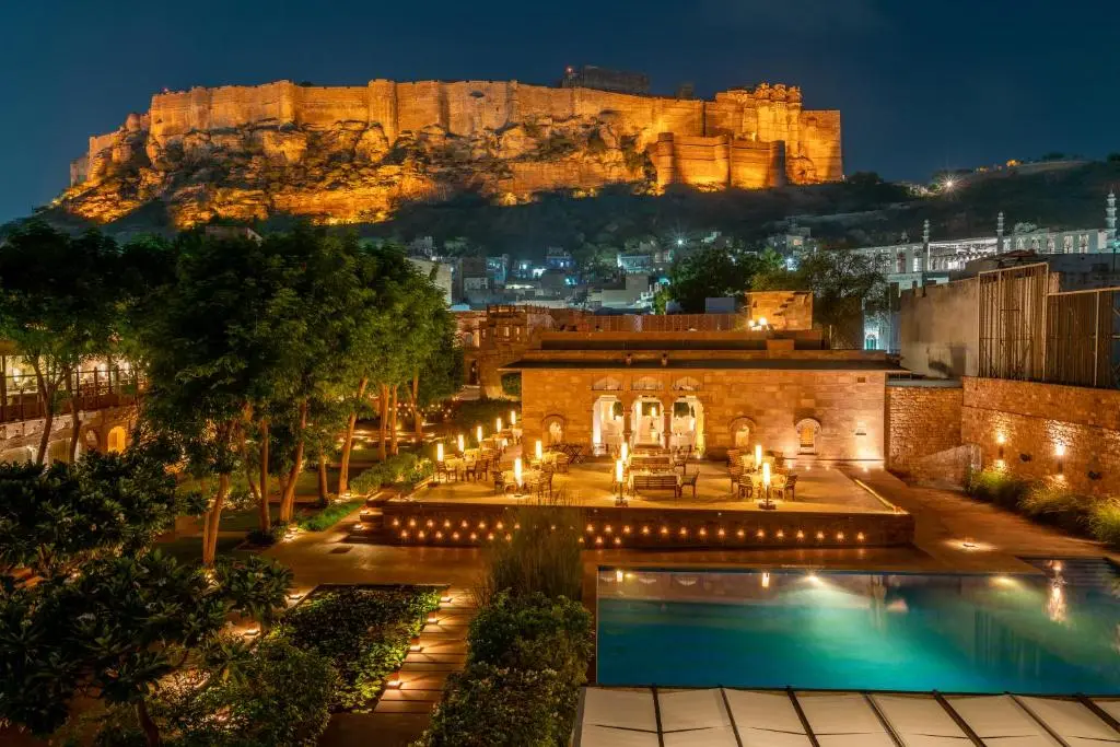 Main Lawn wedding setup at RAAS Jodhpur with fort lit in the background