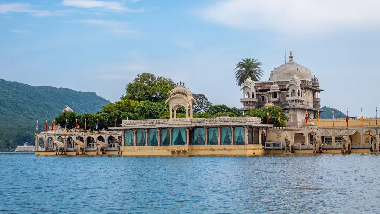 Jagmandir Island Palace Udaipur lit up on Lake Pichola at night
