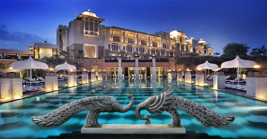 The Leela Palace Udaipur on the banks of Lake Pichola with domes and lakeside façade